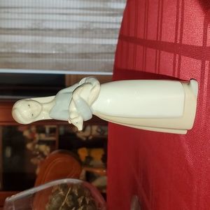 Lladro porcelain figurine of girl holding a pig